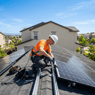 Verified solar technician installing solar panels on rooftop on Aya Sir G!